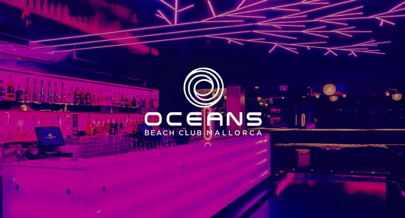 Oceans Beach Club Mallorca interior with violet lighting and the Oceans logo
